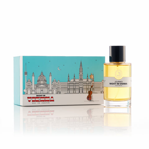 Perfume bottle labeled 'Night in Vienna' with a decorative box featuring a cityscape design.